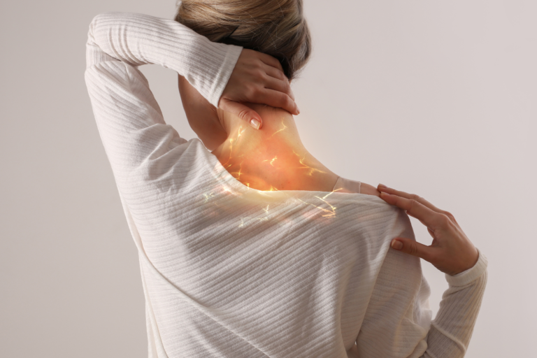 picture of a woman requiring neck pain treatment in Knoxville
